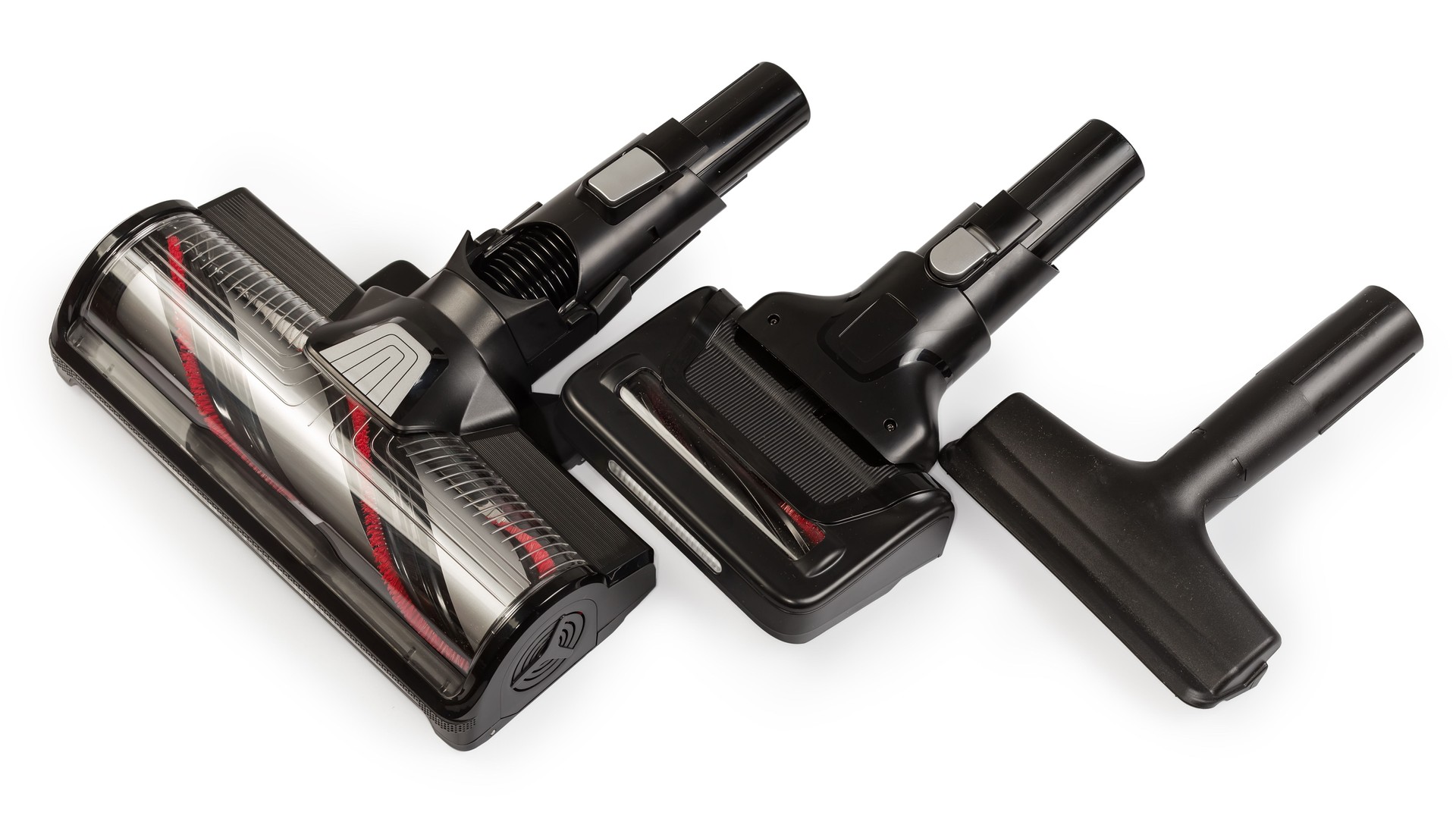 Three vacuum cleaner attachments for dry cleaning of various surfaces